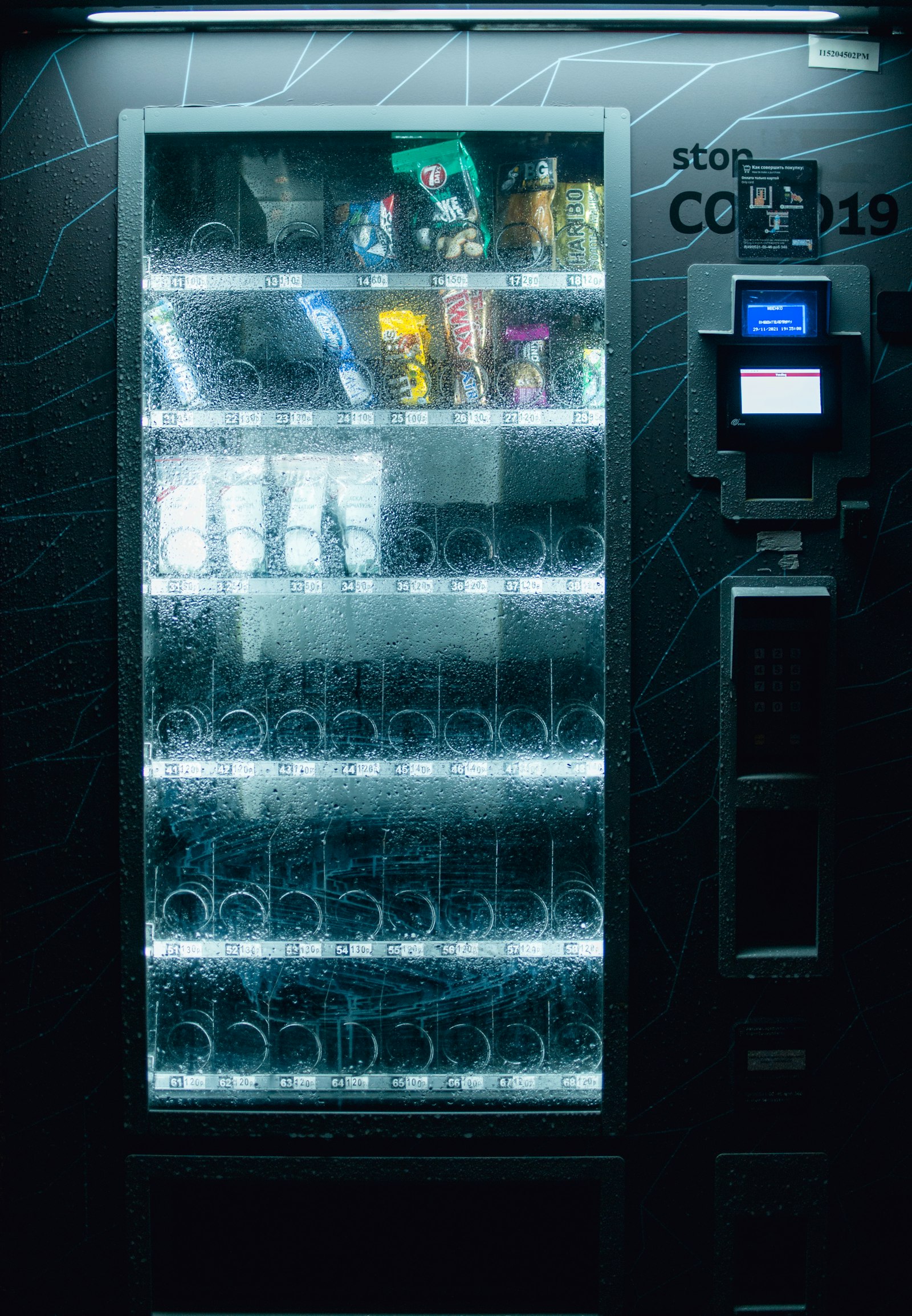 Glass-front combo vending machine with card reader and keypad